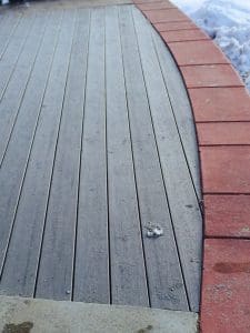 wood decking edged with pavers