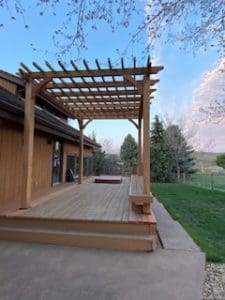 Small deck with arbor viewed from the right side